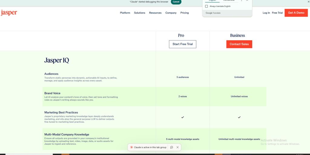 Jasper AI pricing comparison table showing Jasper IQ features - Audiences 3 vs Unlimited, Brand Voice 2 vs Unlimited, Multi-Modal Knowledge 5 vs Unlimited for Pro and Business plans
